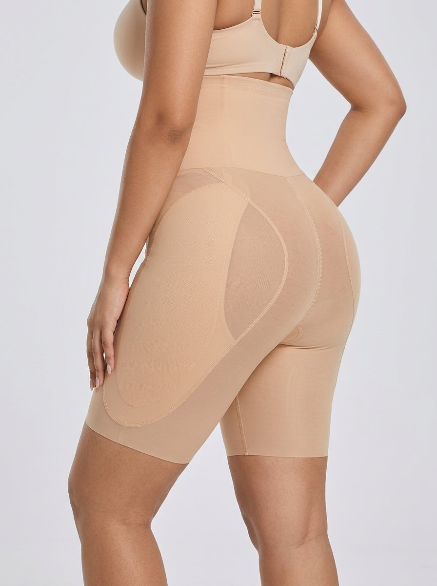 Beige high-waisted hip enhancer shaping shorts, rear three-quarter view — REF36 Beige