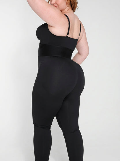 Black structured-waistband shaping jumpsuit, back view — REF6 Black